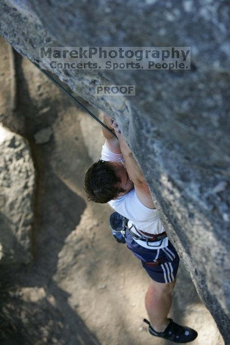 Me top roping Lick the Window (5.10c), shot by Javier Morales from the top of Ack! (5.11b, but using the crack for the start instead) that I top roped up with my camera on my back.  It was another long day of rock climbing at Seismic Wall on Austin's Barton Creek Greenbelt, Sunday, April 5, 2009.

Filename: SRM_20090405_17181714.jpg
Aperture: f/3.2
Shutter Speed: 1/400
Body: Canon EOS-1D Mark II
Lens: Canon EF 80-200mm f/2.8 L