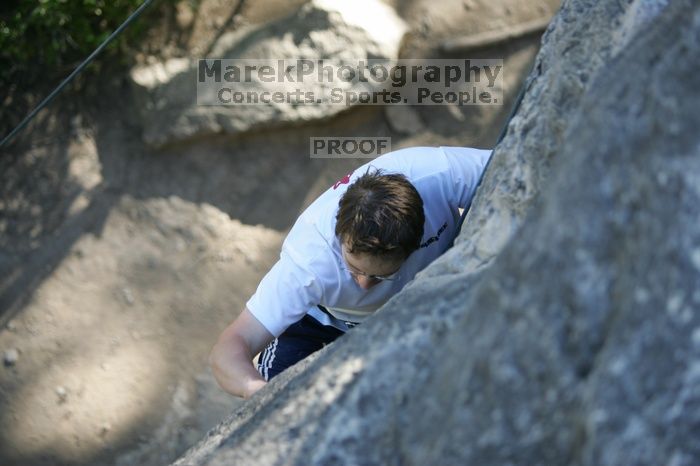 Me top roping Lick the Window (5.10c), shot by Javier Morales from the top of Ack! (5.11b, but using the crack for the start instead) that I top roped up with my camera on my back.  It was another long day of rock climbing at Seismic Wall on Austin's Barton Creek Greenbelt, Sunday, April 5, 2009.

Filename: SRM_20090405_17183531.jpg
Aperture: f/2.8
Shutter Speed: 1/400
Body: Canon EOS-1D Mark II
Lens: Canon EF 80-200mm f/2.8 L