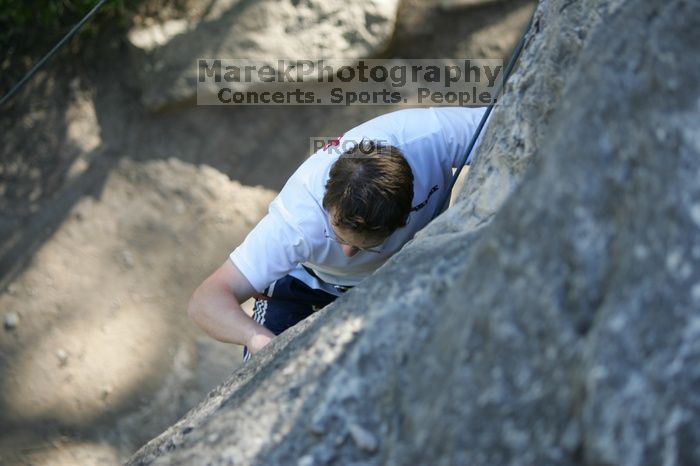 Me top roping Lick the Window (5.10c), shot by Javier Morales from the top of Ack! (5.11b, but using the crack for the start instead) that I top roped up with my camera on my back.  It was another long day of rock climbing at Seismic Wall on Austin's Barton Creek Greenbelt, Sunday, April 5, 2009.

Filename: SRM_20090405_17183633.jpg
Aperture: f/2.8
Shutter Speed: 1/400
Body: Canon EOS-1D Mark II
Lens: Canon EF 80-200mm f/2.8 L