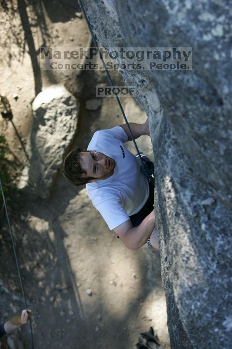 Me top roping Lick the Window (5.10c), shot by Javier Morales from the top of Ack! (5.11b, but using the crack for the start instead) that I top roped up with my camera on my back.  It was another long day of rock climbing at Seismic Wall on Austin's Barton Creek Greenbelt, Sunday, April 5, 2009.

Filename: SRM_20090405_17184838.jpg
Aperture: f/3.5
Shutter Speed: 1/400
Body: Canon EOS-1D Mark II
Lens: Canon EF 80-200mm f/2.8 L