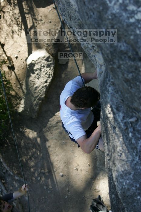 Me top roping Lick the Window (5.10c), shot by Javier Morales from the top of Ack! (5.11b, but using the crack for the start instead) that I top roped up with my camera on my back.  It was another long day of rock climbing at Seismic Wall on Austin's Barton Creek Greenbelt, Sunday, April 5, 2009.

Filename: SRM_20090405_17185140.jpg
Aperture: f/3.5
Shutter Speed: 1/400
Body: Canon EOS-1D Mark II
Lens: Canon EF 80-200mm f/2.8 L