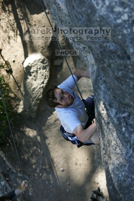 Me top roping Lick the Window (5.10c), shot by Javier Morales from the top of Ack! (5.11b, but using the crack for the start instead) that I top roped up with my camera on my back.  It was another long day of rock climbing at Seismic Wall on Austin's Barton Creek Greenbelt, Sunday, April 5, 2009.

Filename: SRM_20090405_17185746.jpg
Aperture: f/3.5
Shutter Speed: 1/400
Body: Canon EOS-1D Mark II
Lens: Canon EF 80-200mm f/2.8 L