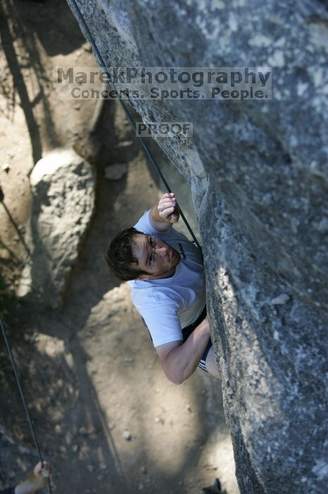 Me top roping Lick the Window (5.10c), shot by Javier Morales from the top of Ack! (5.11b, but using the crack for the start instead) that I top roped up with my camera on my back.  It was another long day of rock climbing at Seismic Wall on Austin's Barton Creek Greenbelt, Sunday, April 5, 2009.

Filename: SRM_20090405_17185851.jpg
Aperture: f/3.5
Shutter Speed: 1/400
Body: Canon EOS-1D Mark II
Lens: Canon EF 80-200mm f/2.8 L