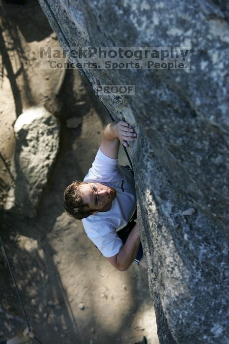 Me top roping Lick the Window (5.10c), shot by Javier Morales from the top of Ack! (5.11b, but using the crack for the start instead) that I top roped up with my camera on my back.  It was another long day of rock climbing at Seismic Wall on Austin's Barton Creek Greenbelt, Sunday, April 5, 2009.

Filename: SRM_20090405_17185954.jpg
Aperture: f/3.5
Shutter Speed: 1/400
Body: Canon EOS-1D Mark II
Lens: Canon EF 80-200mm f/2.8 L