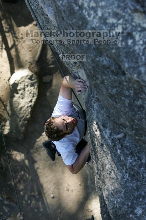 Me top roping Lick the Window (5.10c), shot by Javier Morales from the top of Ack! (5.11b, but using the crack for the start instead) that I top roped up with my camera on my back.  It was another long day of rock climbing at Seismic Wall on Austin's Barton Creek Greenbelt, Sunday, April 5, 2009.

Filename: SRM_20090405_17185956.jpg
Aperture: f/3.5
Shutter Speed: 1/400
Body: Canon EOS-1D Mark II
Lens: Canon EF 80-200mm f/2.8 L