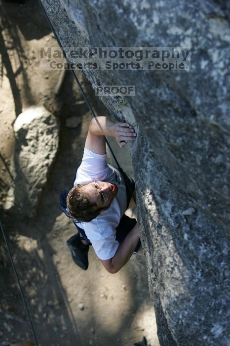 Me top roping Lick the Window (5.10c), shot by Javier Morales from the top of Ack! (5.11b, but using the crack for the start instead) that I top roped up with my camera on my back.  It was another long day of rock climbing at Seismic Wall on Austin's Barton Creek Greenbelt, Sunday, April 5, 2009.

Filename: SRM_20090405_17185958.jpg
Aperture: f/3.5
Shutter Speed: 1/400
Body: Canon EOS-1D Mark II
Lens: Canon EF 80-200mm f/2.8 L