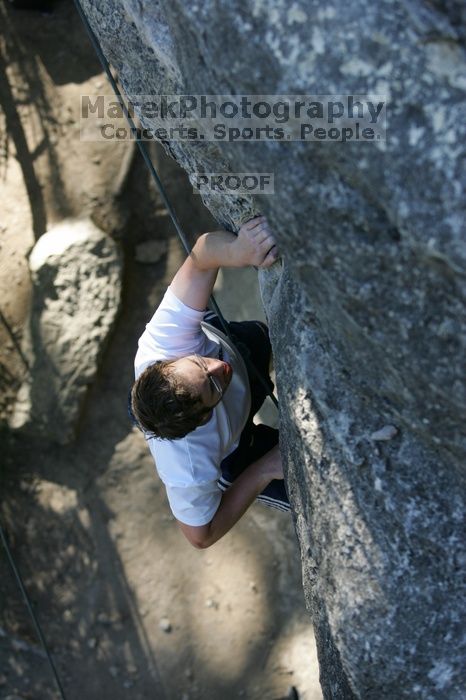 Me top roping Lick the Window (5.10c), shot by Javier Morales from the top of Ack! (5.11b, but using the crack for the start instead) that I top roped up with my camera on my back.  It was another long day of rock climbing at Seismic Wall on Austin's Barton Creek Greenbelt, Sunday, April 5, 2009.

Filename: SRM_20090405_17190059.jpg
Aperture: f/3.5
Shutter Speed: 1/400
Body: Canon EOS-1D Mark II
Lens: Canon EF 80-200mm f/2.8 L