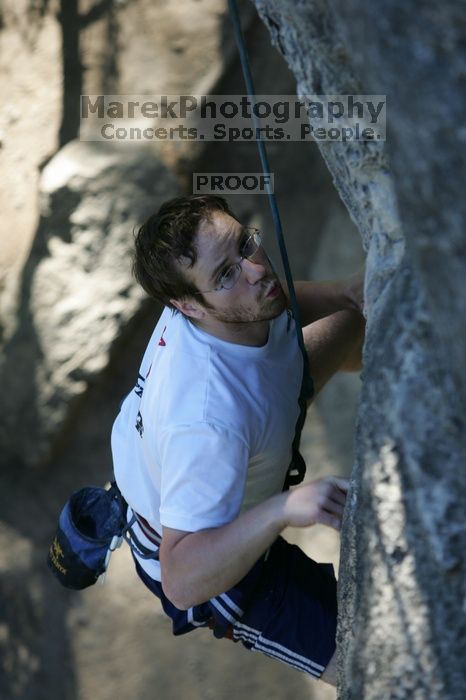 Me top roping Lick the Window (5.10c), shot by Javier Morales from the top of Ack! (5.11b, but using the crack for the start instead) that I top roped up with my camera on my back.  It was another long day of rock climbing at Seismic Wall on Austin's Barton Creek Greenbelt, Sunday, April 5, 2009.

Filename: SRM_20090405_17202170.jpg
Aperture: f/3.5
Shutter Speed: 1/400
Body: Canon EOS-1D Mark II
Lens: Canon EF 80-200mm f/2.8 L