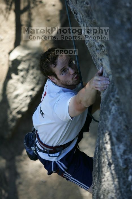 Me top roping Lick the Window (5.10c), shot by Javier Morales from the top of Ack! (5.11b, but using the crack for the start instead) that I top roped up with my camera on my back.  It was another long day of rock climbing at Seismic Wall on Austin's Barton Creek Greenbelt, Sunday, April 5, 2009.

Filename: SRM_20090405_17202277.jpg
Aperture: f/4.0
Shutter Speed: 1/400
Body: Canon EOS-1D Mark II
Lens: Canon EF 80-200mm f/2.8 L