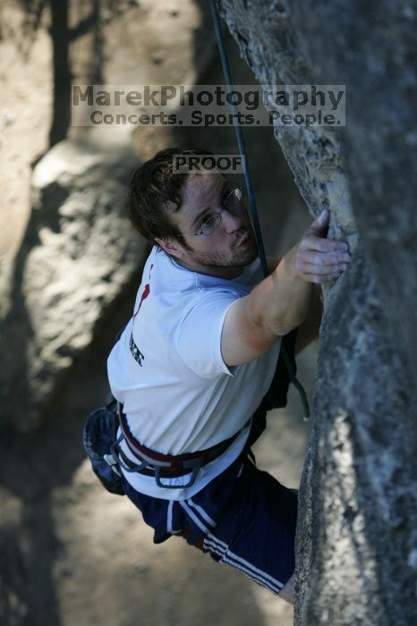 Me top roping Lick the Window (5.10c), shot by Javier Morales from the top of Ack! (5.11b, but using the crack for the start instead) that I top roped up with my camera on my back.  It was another long day of rock climbing at Seismic Wall on Austin's Barton Creek Greenbelt, Sunday, April 5, 2009.

Filename: SRM_20090405_17202378.jpg
Aperture: f/4.0
Shutter Speed: 1/400
Body: Canon EOS-1D Mark II
Lens: Canon EF 80-200mm f/2.8 L