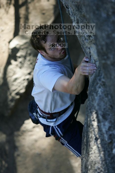 Me top roping Lick the Window (5.10c), shot by Javier Morales from the top of Ack! (5.11b, but using the crack for the start instead) that I top roped up with my camera on my back.  It was another long day of rock climbing at Seismic Wall on Austin's Barton Creek Greenbelt, Sunday, April 5, 2009.

Filename: SRM_20090405_17202380.jpg
Aperture: f/4.0
Shutter Speed: 1/400
Body: Canon EOS-1D Mark II
Lens: Canon EF 80-200mm f/2.8 L