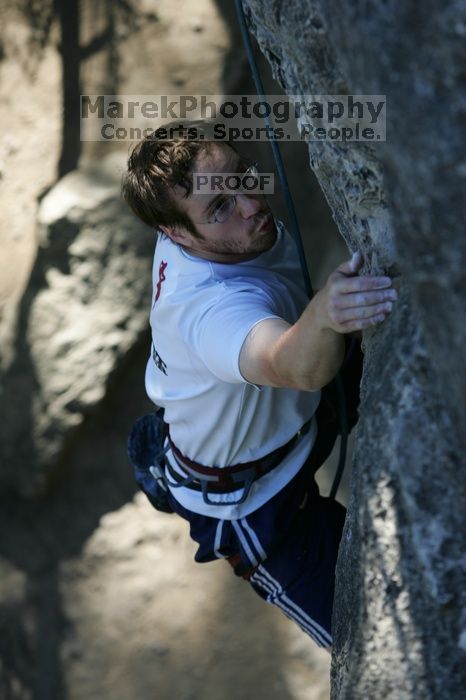 Me top roping Lick the Window (5.10c), shot by Javier Morales from the top of Ack! (5.11b, but using the crack for the start instead) that I top roped up with my camera on my back.  It was another long day of rock climbing at Seismic Wall on Austin's Barton Creek Greenbelt, Sunday, April 5, 2009.

Filename: SRM_20090405_17202381.jpg
Aperture: f/4.0
Shutter Speed: 1/400
Body: Canon EOS-1D Mark II
Lens: Canon EF 80-200mm f/2.8 L