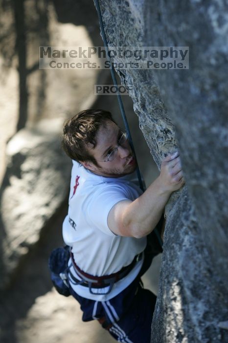 Me top roping Lick the Window (5.10c), shot by Javier Morales from the top of Ack! (5.11b, but using the crack for the start instead) that I top roped up with my camera on my back.  It was another long day of rock climbing at Seismic Wall on Austin's Barton Creek Greenbelt, Sunday, April 5, 2009.

Filename: SRM_20090405_17202383.jpg
Aperture: f/3.5
Shutter Speed: 1/400
Body: Canon EOS-1D Mark II
Lens: Canon EF 80-200mm f/2.8 L