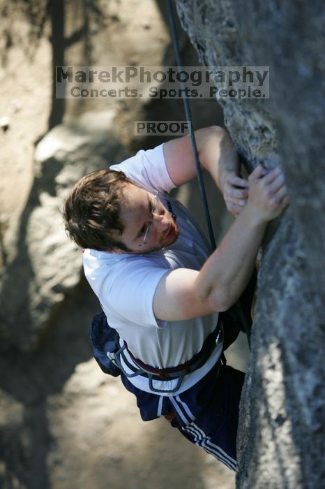 Me top roping Lick the Window (5.10c), shot by Javier Morales from the top of Ack! (5.11b, but using the crack for the start instead) that I top roped up with my camera on my back.  It was another long day of rock climbing at Seismic Wall on Austin's Barton Creek Greenbelt, Sunday, April 5, 2009.

Filename: SRM_20090405_17202585.jpg
Aperture: f/3.5
Shutter Speed: 1/400
Body: Canon EOS-1D Mark II
Lens: Canon EF 80-200mm f/2.8 L