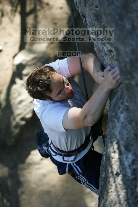 Me top roping Lick the Window (5.10c), shot by Javier Morales from the top of Ack! (5.11b, but using the crack for the start instead) that I top roped up with my camera on my back.  It was another long day of rock climbing at Seismic Wall on Austin's Barton Creek Greenbelt, Sunday, April 5, 2009.

Filename: SRM_20090405_17202586.jpg
Aperture: f/3.5
Shutter Speed: 1/400
Body: Canon EOS-1D Mark II
Lens: Canon EF 80-200mm f/2.8 L