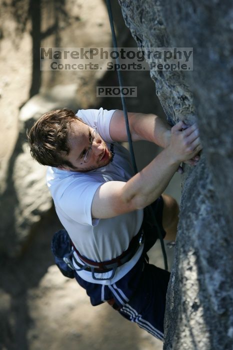 Me top roping Lick the Window (5.10c), shot by Javier Morales from the top of Ack! (5.11b, but using the crack for the start instead) that I top roped up with my camera on my back.  It was another long day of rock climbing at Seismic Wall on Austin's Barton Creek Greenbelt, Sunday, April 5, 2009.

Filename: SRM_20090405_17202688.jpg
Aperture: f/3.5
Shutter Speed: 1/400
Body: Canon EOS-1D Mark II
Lens: Canon EF 80-200mm f/2.8 L