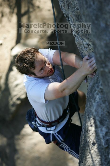 Me top roping Lick the Window (5.10c), shot by Javier Morales from the top of Ack! (5.11b, but using the crack for the start instead) that I top roped up with my camera on my back.  It was another long day of rock climbing at Seismic Wall on Austin's Barton Creek Greenbelt, Sunday, April 5, 2009.

Filename: SRM_20090405_17202689.jpg
Aperture: f/3.5
Shutter Speed: 1/400
Body: Canon EOS-1D Mark II
Lens: Canon EF 80-200mm f/2.8 L