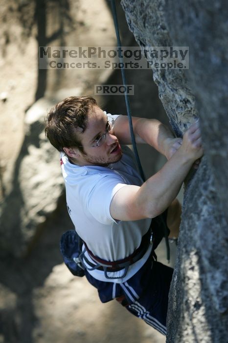 Me top roping Lick the Window (5.10c), shot by Javier Morales from the top of Ack! (5.11b, but using the crack for the start instead) that I top roped up with my camera on my back.  It was another long day of rock climbing at Seismic Wall on Austin's Barton Creek Greenbelt, Sunday, April 5, 2009.

Filename: SRM_20090405_17202691.jpg
Aperture: f/3.5
Shutter Speed: 1/400
Body: Canon EOS-1D Mark II
Lens: Canon EF 80-200mm f/2.8 L