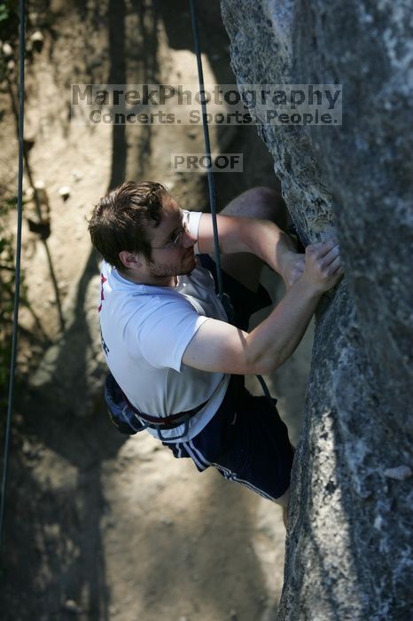 Me top roping Lick the Window (5.10c), shot by Javier Morales from the top of Ack! (5.11b, but using the crack for the start instead) that I top roped up with my camera on my back.  It was another long day of rock climbing at Seismic Wall on Austin's Barton Creek Greenbelt, Sunday, April 5, 2009.

Filename: SRM_20090405_17202893.jpg
Aperture: f/4.0
Shutter Speed: 1/400
Body: Canon EOS-1D Mark II
Lens: Canon EF 80-200mm f/2.8 L