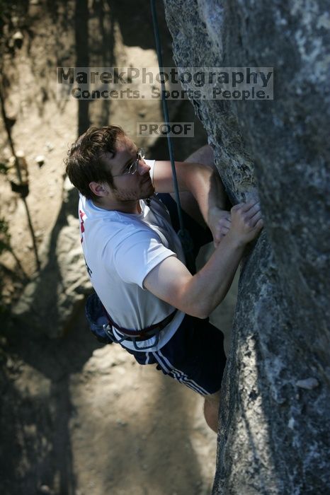 Me top roping Lick the Window (5.10c), shot by Javier Morales from the top of Ack! (5.11b, but using the crack for the start instead) that I top roped up with my camera on my back.  It was another long day of rock climbing at Seismic Wall on Austin's Barton Creek Greenbelt, Sunday, April 5, 2009.

Filename: SRM_20090405_17202995.jpg
Aperture: f/4.0
Shutter Speed: 1/400
Body: Canon EOS-1D Mark II
Lens: Canon EF 80-200mm f/2.8 L