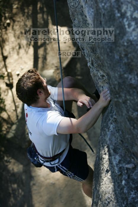 Me top roping Lick the Window (5.10c), shot by Javier Morales from the top of Ack! (5.11b, but using the crack for the start instead) that I top roped up with my camera on my back.  It was another long day of rock climbing at Seismic Wall on Austin's Barton Creek Greenbelt, Sunday, April 5, 2009.

Filename: SRM_20090405_17202996.jpg
Aperture: f/4.0
Shutter Speed: 1/400
Body: Canon EOS-1D Mark II
Lens: Canon EF 80-200mm f/2.8 L