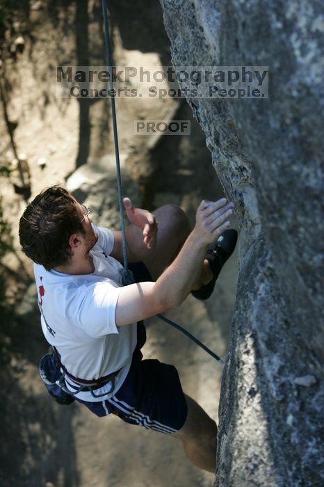 Me top roping Lick the Window (5.10c), shot by Javier Morales from the top of Ack! (5.11b, but using the crack for the start instead) that I top roped up with my camera on my back.  It was another long day of rock climbing at Seismic Wall on Austin's Barton Creek Greenbelt, Sunday, April 5, 2009.

Filename: SRM_20090405_17202997.jpg
Aperture: f/3.5
Shutter Speed: 1/400
Body: Canon EOS-1D Mark II
Lens: Canon EF 80-200mm f/2.8 L