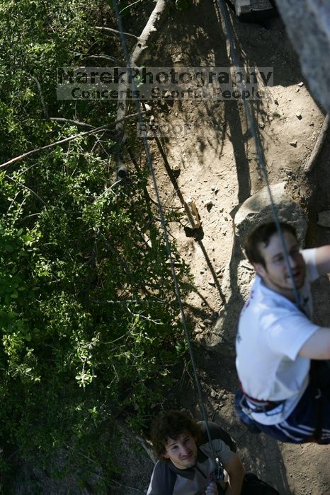 Me top roping Lick the Window (5.10c), shot by Javier Morales from the top of Ack! (5.11b, but using the crack for the start instead) that I top roped up with my camera on my back.  It was another long day of rock climbing at Seismic Wall on Austin's Barton Creek Greenbelt, Sunday, April 5, 2009.

Filename: SRM_20090405_17210598.jpg
Aperture: f/3.5
Shutter Speed: 1/400
Body: Canon EOS-1D Mark II
Lens: Canon EF 80-200mm f/2.8 L