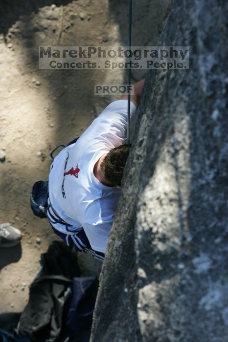 Me top roping Lick the Window (5.10c), shot by Javier Morales from the top of Ack! (5.11b, but using the crack for the start instead) that I top roped up with my camera on my back.  It was another long day of rock climbing at Seismic Wall on Austin's Barton Creek Greenbelt, Sunday, April 5, 2009.

Filename: SRM_20090405_17232104.jpg
Aperture: f/6.3
Shutter Speed: 1/320
Body: Canon EOS-1D Mark II
Lens: Canon EF 80-200mm f/2.8 L