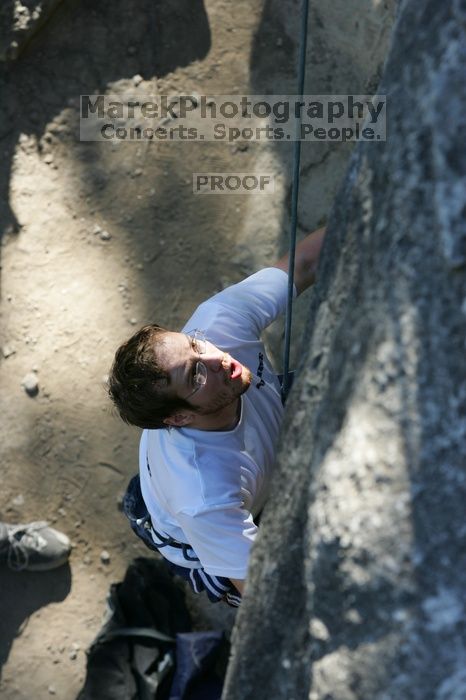 Me top roping Lick the Window (5.10c), shot by Javier Morales from the top of Ack! (5.11b, but using the crack for the start instead) that I top roped up with my camera on my back.  It was another long day of rock climbing at Seismic Wall on Austin's Barton Creek Greenbelt, Sunday, April 5, 2009.

Filename: SRM_20090405_17232306.jpg
Aperture: f/5.6
Shutter Speed: 1/320
Body: Canon EOS-1D Mark II
Lens: Canon EF 80-200mm f/2.8 L