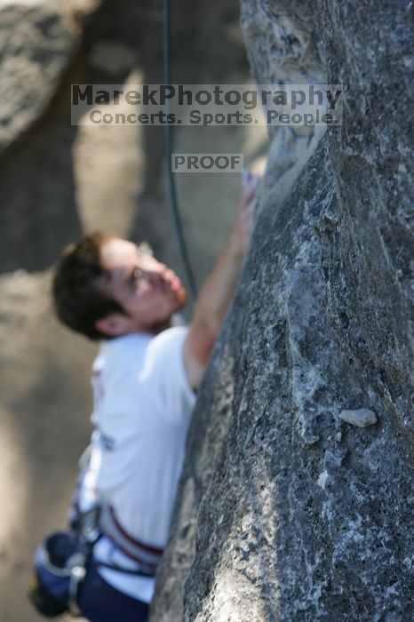 Me top roping Lick the Window (5.10c), shot by Javier Morales from the top of Ack! (5.11b, but using the crack for the start instead) that I top roped up with my camera on my back.  It was another long day of rock climbing at Seismic Wall on Austin's Barton Creek Greenbelt, Sunday, April 5, 2009.

Filename: SRM_20090405_17232409.jpg
Aperture: f/4.5
Shutter Speed: 1/320
Body: Canon EOS-1D Mark II
Lens: Canon EF 80-200mm f/2.8 L