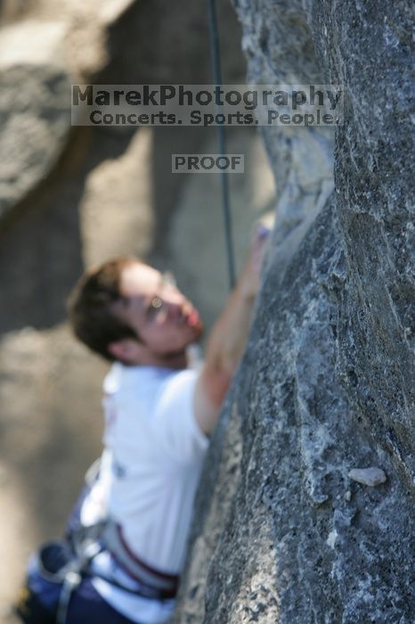 Me top roping Lick the Window (5.10c), shot by Javier Morales from the top of Ack! (5.11b, but using the crack for the start instead) that I top roped up with my camera on my back.  It was another long day of rock climbing at Seismic Wall on Austin's Barton Creek Greenbelt, Sunday, April 5, 2009.

Filename: SRM_20090405_17232410.jpg
Aperture: f/4.5
Shutter Speed: 1/320
Body: Canon EOS-1D Mark II
Lens: Canon EF 80-200mm f/2.8 L