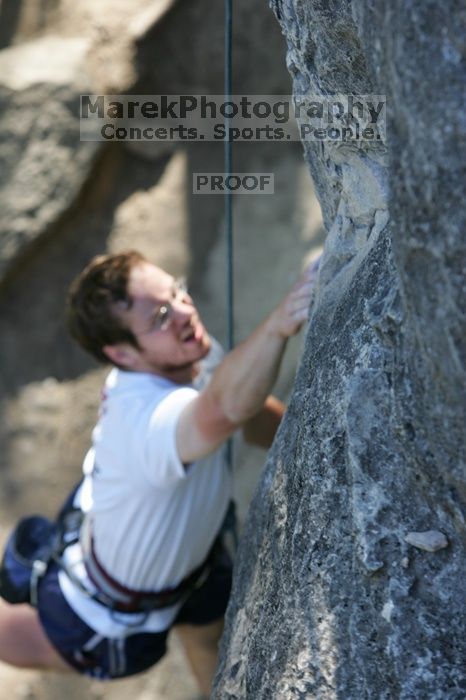 Me top roping Lick the Window (5.10c), shot by Javier Morales from the top of Ack! (5.11b, but using the crack for the start instead) that I top roped up with my camera on my back.  It was another long day of rock climbing at Seismic Wall on Austin's Barton Creek Greenbelt, Sunday, April 5, 2009.

Filename: SRM_20090405_17232412.jpg
Aperture: f/4.5
Shutter Speed: 1/320
Body: Canon EOS-1D Mark II
Lens: Canon EF 80-200mm f/2.8 L