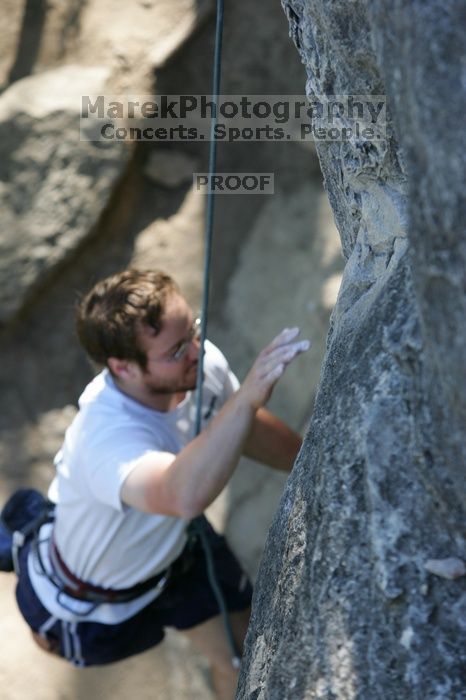 Me top roping Lick the Window (5.10c), shot by Javier Morales from the top of Ack! (5.11b, but using the crack for the start instead) that I top roped up with my camera on my back.  It was another long day of rock climbing at Seismic Wall on Austin's Barton Creek Greenbelt, Sunday, April 5, 2009.

Filename: SRM_20090405_17232413.jpg
Aperture: f/4.5
Shutter Speed: 1/320
Body: Canon EOS-1D Mark II
Lens: Canon EF 80-200mm f/2.8 L