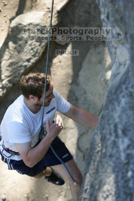 Me top roping Lick the Window (5.10c), shot by Javier Morales from the top of Ack! (5.11b, but using the crack for the start instead) that I top roped up with my camera on my back.  It was another long day of rock climbing at Seismic Wall on Austin's Barton Creek Greenbelt, Sunday, April 5, 2009.

Filename: SRM_20090405_17232414.jpg
Aperture: f/4.5
Shutter Speed: 1/320
Body: Canon EOS-1D Mark II
Lens: Canon EF 80-200mm f/2.8 L