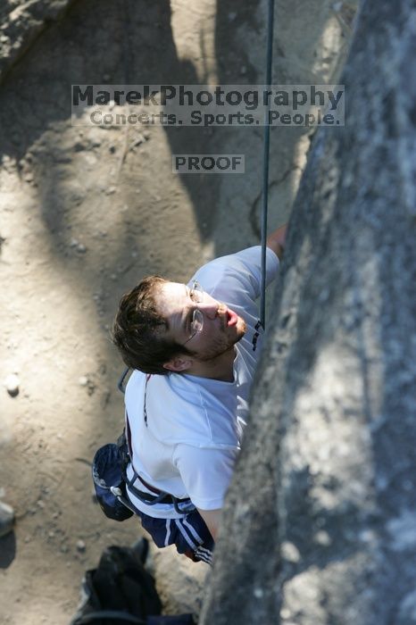 Me top roping Lick the Window (5.10c), shot by Javier Morales from the top of Ack! (5.11b, but using the crack for the start instead) that I top roped up with my camera on my back.  It was another long day of rock climbing at Seismic Wall on Austin's Barton Creek Greenbelt, Sunday, April 5, 2009.

Filename: SRM_20090405_17240915.jpg
Aperture: f/4.5
Shutter Speed: 1/320
Body: Canon EOS-1D Mark II
Lens: Canon EF 80-200mm f/2.8 L