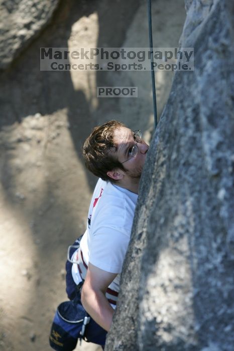 Me top roping Lick the Window (5.10c), shot by Javier Morales from the top of Ack! (5.11b, but using the crack for the start instead) that I top roped up with my camera on my back.  It was another long day of rock climbing at Seismic Wall on Austin's Barton Creek Greenbelt, Sunday, April 5, 2009.

Filename: SRM_20090405_17241120.jpg
Aperture: f/4.5
Shutter Speed: 1/320
Body: Canon EOS-1D Mark II
Lens: Canon EF 80-200mm f/2.8 L