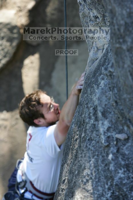 Me top roping Lick the Window (5.10c), shot by Javier Morales from the top of Ack! (5.11b, but using the crack for the start instead) that I top roped up with my camera on my back.  It was another long day of rock climbing at Seismic Wall on Austin's Barton Creek Greenbelt, Sunday, April 5, 2009.

Filename: SRM_20090405_17241123.jpg
Aperture: f/4.5
Shutter Speed: 1/320
Body: Canon EOS-1D Mark II
Lens: Canon EF 80-200mm f/2.8 L