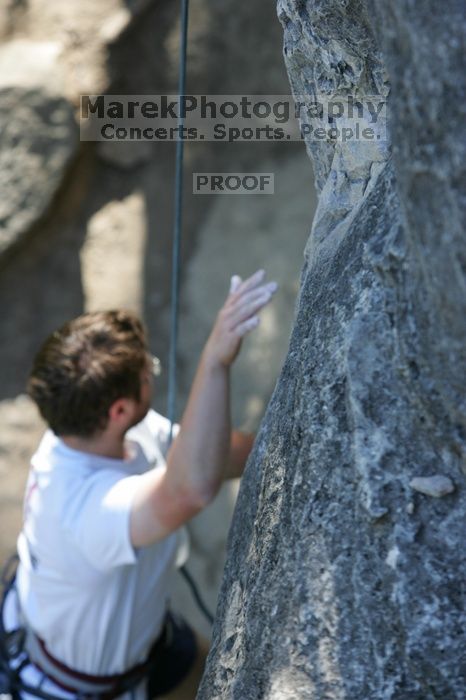 Me top roping Lick the Window (5.10c), shot by Javier Morales from the top of Ack! (5.11b, but using the crack for the start instead) that I top roped up with my camera on my back.  It was another long day of rock climbing at Seismic Wall on Austin's Barton Creek Greenbelt, Sunday, April 5, 2009.

Filename: SRM_20090405_17241124.jpg
Aperture: f/4.5
Shutter Speed: 1/320
Body: Canon EOS-1D Mark II
Lens: Canon EF 80-200mm f/2.8 L