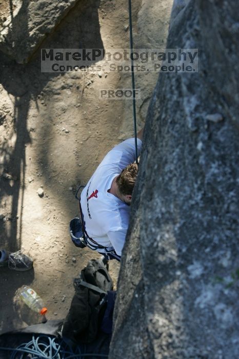 Me top roping Lick the Window (5.10c), shot by Javier Morales from the top of Ack! (5.11b, but using the crack for the start instead) that I top roped up with my camera on my back.  It was another long day of rock climbing at Seismic Wall on Austin's Barton Creek Greenbelt, Sunday, April 5, 2009.

Filename: SRM_20090405_17260327.jpg
Aperture: f/5.6
Shutter Speed: 1/320
Body: Canon EOS-1D Mark II
Lens: Canon EF 80-200mm f/2.8 L