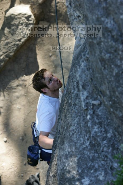 Me top roping Lick the Window (5.10c), shot by Javier Morales from the top of Ack! (5.11b, but using the crack for the start instead) that I top roped up with my camera on my back.  It was another long day of rock climbing at Seismic Wall on Austin's Barton Creek Greenbelt, Sunday, April 5, 2009.

Filename: SRM_20090405_17260731.jpg
Aperture: f/4.5
Shutter Speed: 1/320
Body: Canon EOS-1D Mark II
Lens: Canon EF 80-200mm f/2.8 L