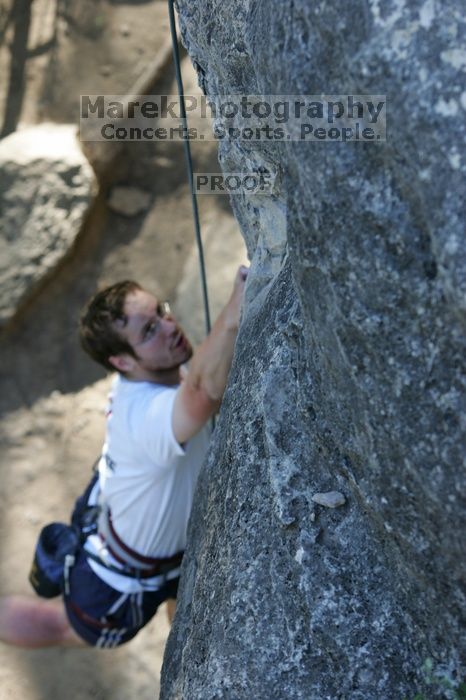 Me top roping Lick the Window (5.10c), shot by Javier Morales from the top of Ack! (5.11b, but using the crack for the start instead) that I top roped up with my camera on my back.  It was another long day of rock climbing at Seismic Wall on Austin's Barton Creek Greenbelt, Sunday, April 5, 2009.

Filename: SRM_20090405_17260834.jpg
Aperture: f/4.5
Shutter Speed: 1/320
Body: Canon EOS-1D Mark II
Lens: Canon EF 80-200mm f/2.8 L