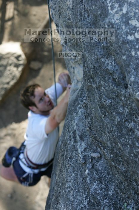 Me top roping Lick the Window (5.10c), shot by Javier Morales from the top of Ack! (5.11b, but using the crack for the start instead) that I top roped up with my camera on my back.  It was another long day of rock climbing at Seismic Wall on Austin's Barton Creek Greenbelt, Sunday, April 5, 2009.

Filename: SRM_20090405_17260835.jpg
Aperture: f/4.5
Shutter Speed: 1/320
Body: Canon EOS-1D Mark II
Lens: Canon EF 80-200mm f/2.8 L