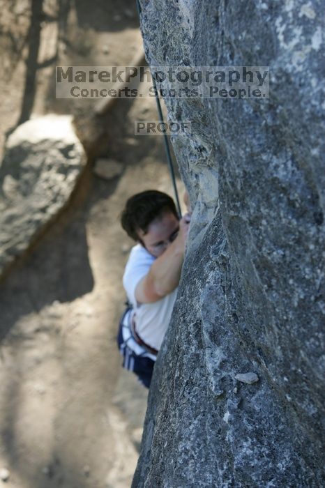 Me top roping Lick the Window (5.10c), shot by Javier Morales from the top of Ack! (5.11b, but using the crack for the start instead) that I top roped up with my camera on my back.  It was another long day of rock climbing at Seismic Wall on Austin's Barton Creek Greenbelt, Sunday, April 5, 2009.

Filename: SRM_20090405_17260839.jpg
Aperture: f/4.5
Shutter Speed: 1/320
Body: Canon EOS-1D Mark II
Lens: Canon EF 80-200mm f/2.8 L