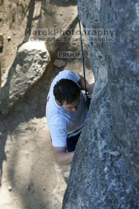 Me top roping Lick the Window (5.10c), shot by Javier Morales from the top of Ack! (5.11b, but using the crack for the start instead) that I top roped up with my camera on my back.  It was another long day of rock climbing at Seismic Wall on Austin's Barton Creek Greenbelt, Sunday, April 5, 2009.

Filename: SRM_20090405_17261953.jpg
Aperture: f/4.5
Shutter Speed: 1/320
Body: Canon EOS-1D Mark II
Lens: Canon EF 80-200mm f/2.8 L