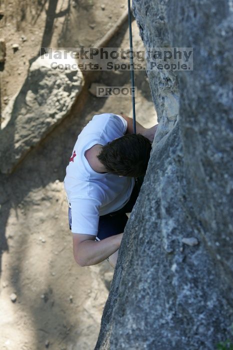 Me top roping Lick the Window (5.10c), shot by Javier Morales from the top of Ack! (5.11b, but using the crack for the start instead) that I top roped up with my camera on my back.  It was another long day of rock climbing at Seismic Wall on Austin's Barton Creek Greenbelt, Sunday, April 5, 2009.

Filename: SRM_20090405_17262461.jpg
Aperture: f/4.5
Shutter Speed: 1/320
Body: Canon EOS-1D Mark II
Lens: Canon EF 80-200mm f/2.8 L