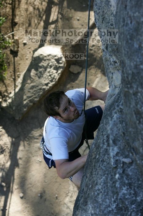 Me top roping Lick the Window (5.10c), shot by Javier Morales from the top of Ack! (5.11b, but using the crack for the start instead) that I top roped up with my camera on my back.  It was another long day of rock climbing at Seismic Wall on Austin's Barton Creek Greenbelt, Sunday, April 5, 2009.

Filename: SRM_20090405_17263063.jpg
Aperture: f/5.0
Shutter Speed: 1/320
Body: Canon EOS-1D Mark II
Lens: Canon EF 80-200mm f/2.8 L