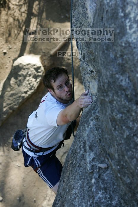 Me top roping Lick the Window (5.10c), shot by Javier Morales from the top of Ack! (5.11b, but using the crack for the start instead) that I top roped up with my camera on my back.  It was another long day of rock climbing at Seismic Wall on Austin's Barton Creek Greenbelt, Sunday, April 5, 2009.

Filename: SRM_20090405_17263165.jpg
Aperture: f/5.0
Shutter Speed: 1/320
Body: Canon EOS-1D Mark II
Lens: Canon EF 80-200mm f/2.8 L