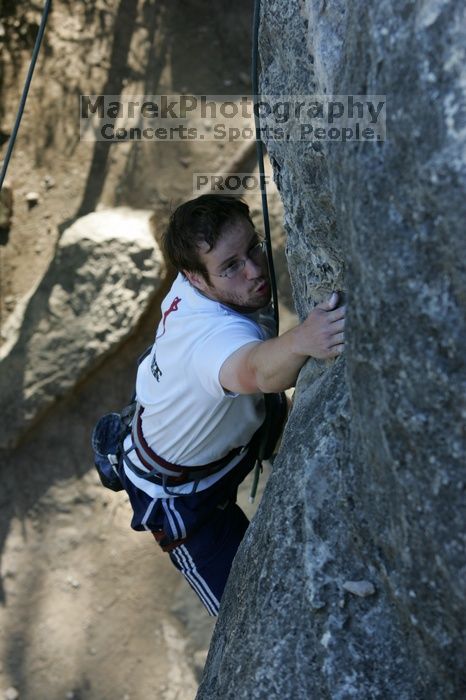 Me top roping Lick the Window (5.10c), shot by Javier Morales from the top of Ack! (5.11b, but using the crack for the start instead) that I top roped up with my camera on my back.  It was another long day of rock climbing at Seismic Wall on Austin's Barton Creek Greenbelt, Sunday, April 5, 2009.

Filename: SRM_20090405_17263170.jpg
Aperture: f/5.0
Shutter Speed: 1/320
Body: Canon EOS-1D Mark II
Lens: Canon EF 80-200mm f/2.8 L