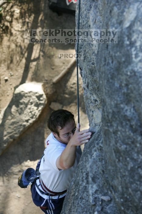 Me top roping Lick the Window (5.10c), shot by Javier Morales from the top of Ack! (5.11b, but using the crack for the start instead) that I top roped up with my camera on my back.  It was another long day of rock climbing at Seismic Wall on Austin's Barton Creek Greenbelt, Sunday, April 5, 2009.

Filename: SRM_20090405_17263276.jpg
Aperture: f/4.5
Shutter Speed: 1/320
Body: Canon EOS-1D Mark II
Lens: Canon EF 80-200mm f/2.8 L