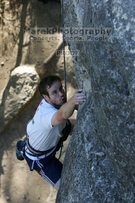 Me top roping Lick the Window (5.10c), shot by Javier Morales from the top of Ack! (5.11b, but using the crack for the start instead) that I top roped up with my camera on my back.  It was another long day of rock climbing at Seismic Wall on Austin's Barton Creek Greenbelt, Sunday, April 5, 2009.

Filename: SRM_20090405_17264981.jpg
Aperture: f/5.0
Shutter Speed: 1/320
Body: Canon EOS-1D Mark II
Lens: Canon EF 80-200mm f/2.8 L